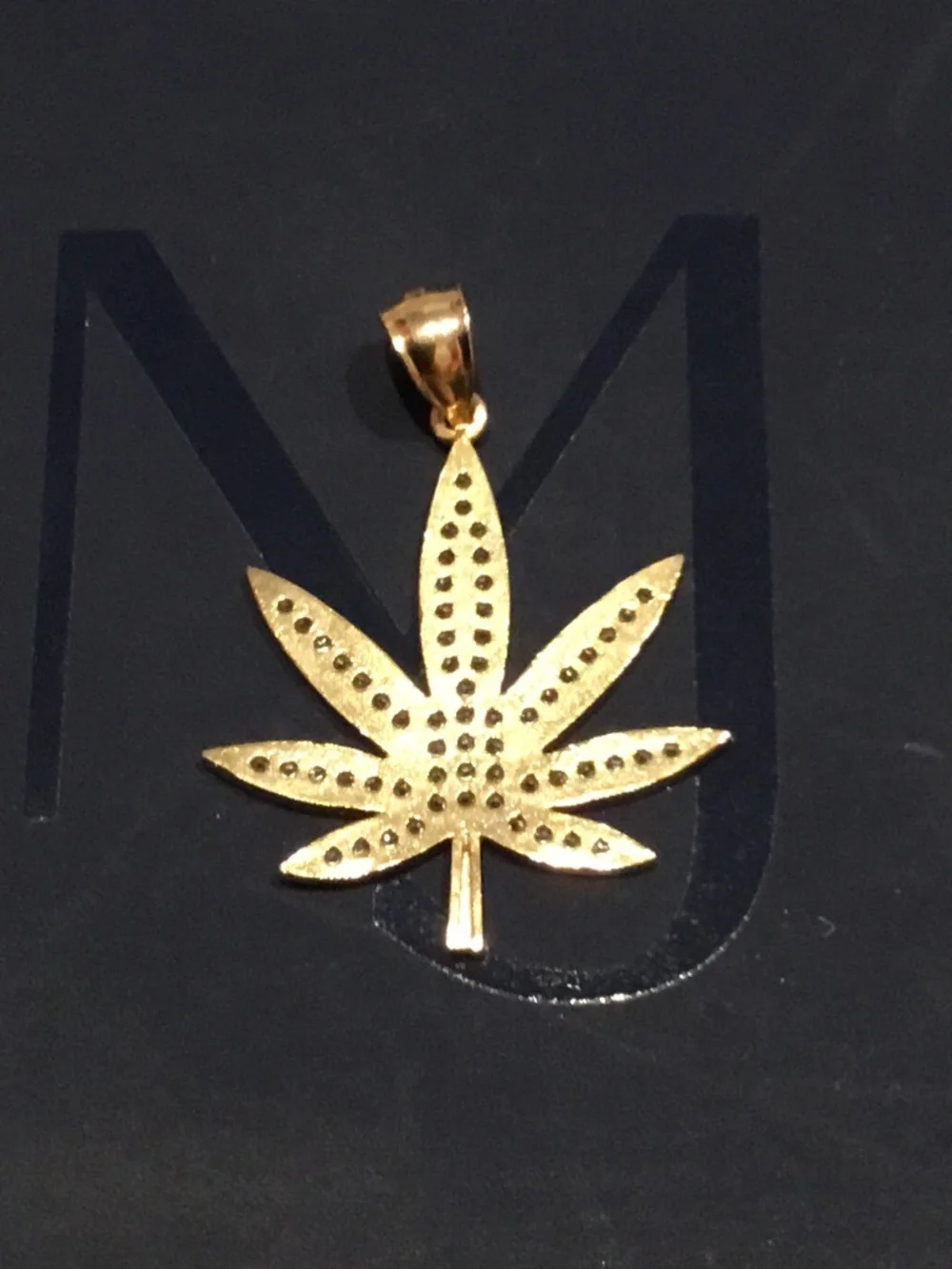 14 kt gold pendant marijuana leaf cz stones iced out 4 grams